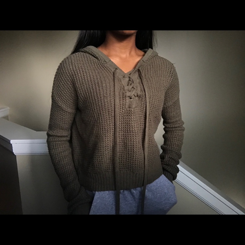 green sweater